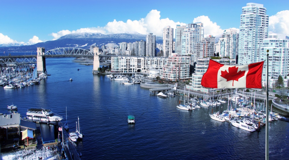 View-of-Vancouver-with-Canadian-flag-flying-HannamariahShutterstock
